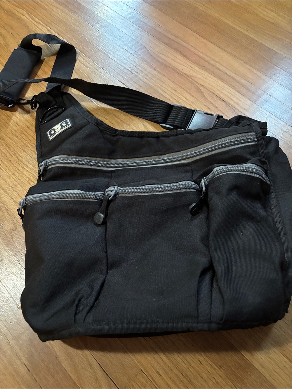 Diaper Dude Black Men's Crossbody Diaper Bag with Multiple Zippered Pockets